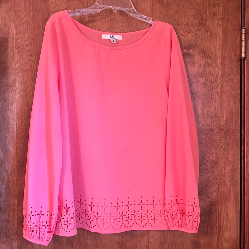 Coral blouse with perforation detail